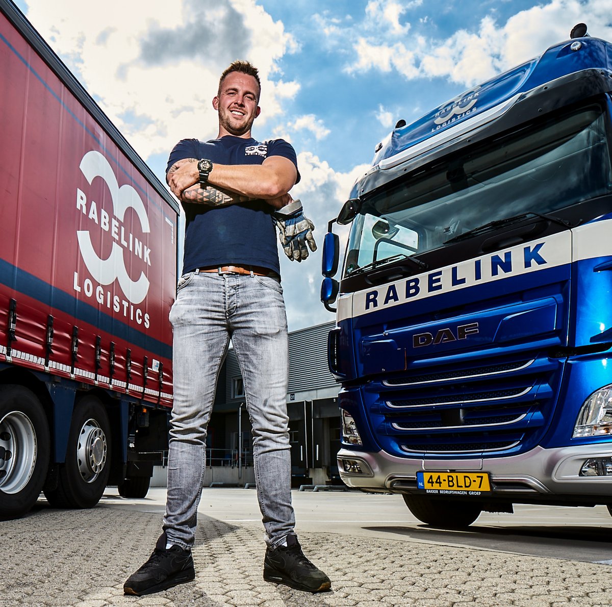 Rabelink driver standing in front of a truck